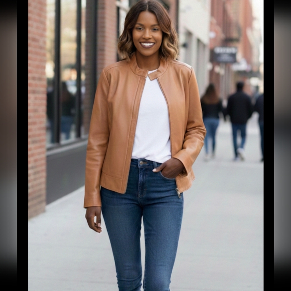 Camel colored genuine leather jacket size Medium for women.